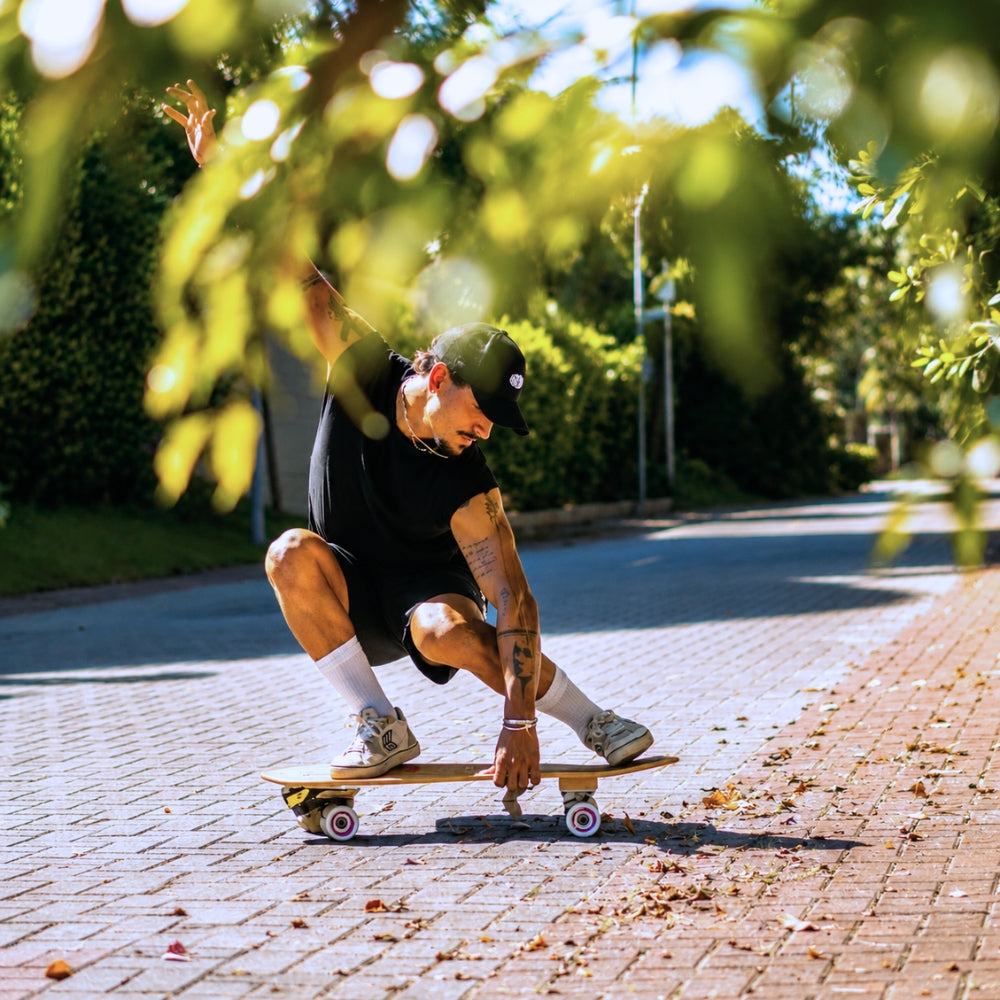 Rider learning to carve on a SpiceSkate Type X3 surfskate
